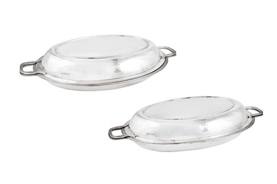 Lot 672 - Queen Charlotte – A large pair of George III sterling silver entrée dishes, London 1805 by Robert Garrard I (reg. 11th Aug 1802)