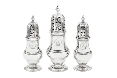 Lot 694 - A graduated set of three George II Scottish sterling silver casters, Edinburgh 1754 by by James Gilliland (1721-91, reg. 1748)