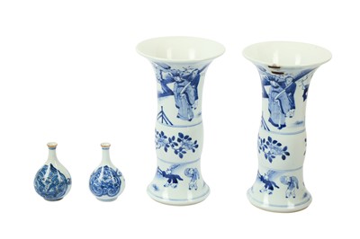 Lot 304 - AMENDED DESCRIPTION: A PAIR OF CHINESE BLUE AND WHITE GU VASES, IN THE KANGXI STYLE