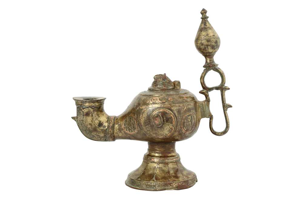 Lot 102 A KHORASANREVIVAL COPPERINLAID BRASS OIL