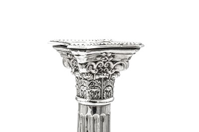 Lot 566 - A pair of George V sterling silver candlesticks, Birmingham 1928 by S. Blackenese and Sons