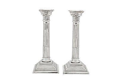 Lot 566 - A pair of George V sterling silver candlesticks, Birmingham 1928 by S. Blackenese and Sons