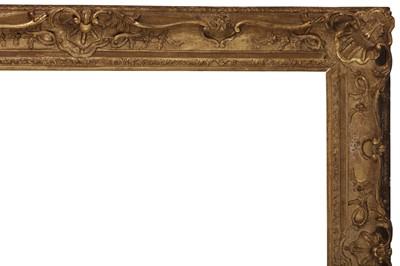 Lot 102 - A FRENCH LOUIS XV CARVED, PIERCED AND SWEPT GILDED FRAME