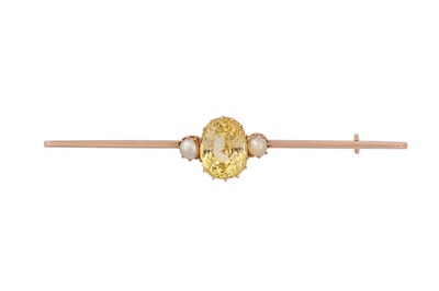 Lot 159 - A yellow sapphire and pearl bar brooch, circa 1905