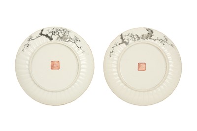 Lot 216 - A PAIR OF CHINESE EN GRISAILLE-DECORATED 'PRUNUS' DISHES.