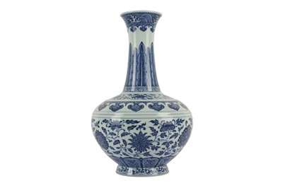 Lot 951 - A CHINESE MING-STYLE BLUE AND WHITE BOTTLE VASE.