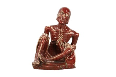 Lot 260 - A CHINESE FLAMBÉ-GLAZED FIGURE OF A LUOHAN.