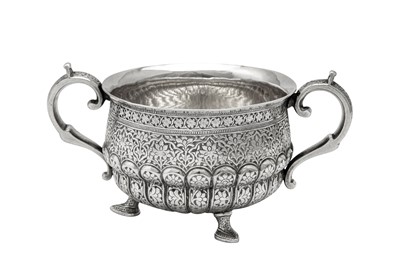 Lot 146 - A late 19th century Anglo – Indian unmarked silver twin handled sugar bowl, Kashmir circa 1880