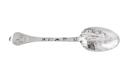 Lot 495 - A Queen Anne provincial West Country Britannia standard silver ‘lace back’ trifid spoon, Exeter 1707 by Edward Sweet of Dunster (b.1673-c.1737)