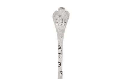 Lot 495 - A Queen Anne provincial West Country Britannia standard silver ‘lace back’ trifid spoon, Exeter 1707 by Edward Sweet of Dunster (b.1673-c.1737)