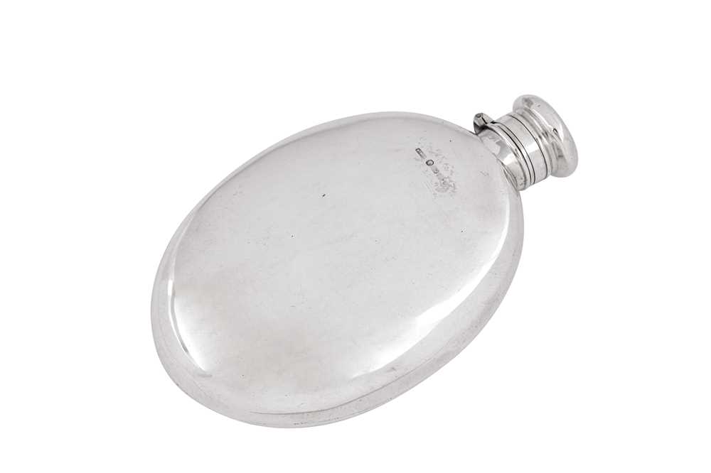 Lot 85 - A Victorian provincial sterling silver spirit hip flask, Chester 1877 by Barnet Henry Joseph & Co