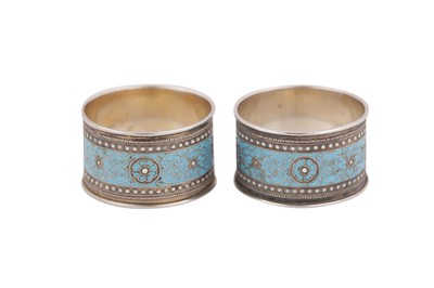 Lot 463 - A pair of early 20th century Norwegian silver and cloisonné enamel napkin rings, Oslo circa 1910 by Norsk Filigransfabrik