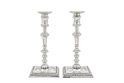 Lot 699 - A pair of George II sterling silver candlesticks, London 1758 by William Cafe