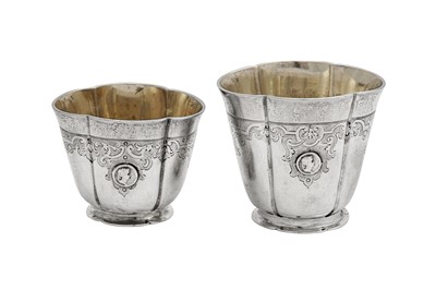 Lot 450 - A graduated pair of early 18th century German silver stacking beakers, Augsburg 1723-35 by Johann Ulrich Jebenz (died 1742)