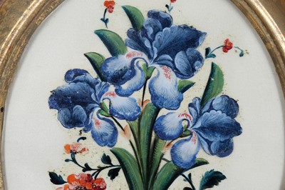 Lot 199 - AN OVAL REVERSE GLASS PAINTING OF IRISES