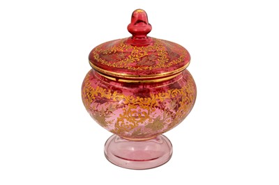 Lot 1058 - A LARGE GILT AND ENAMELLED PINK GLASS LIDDED BOWL