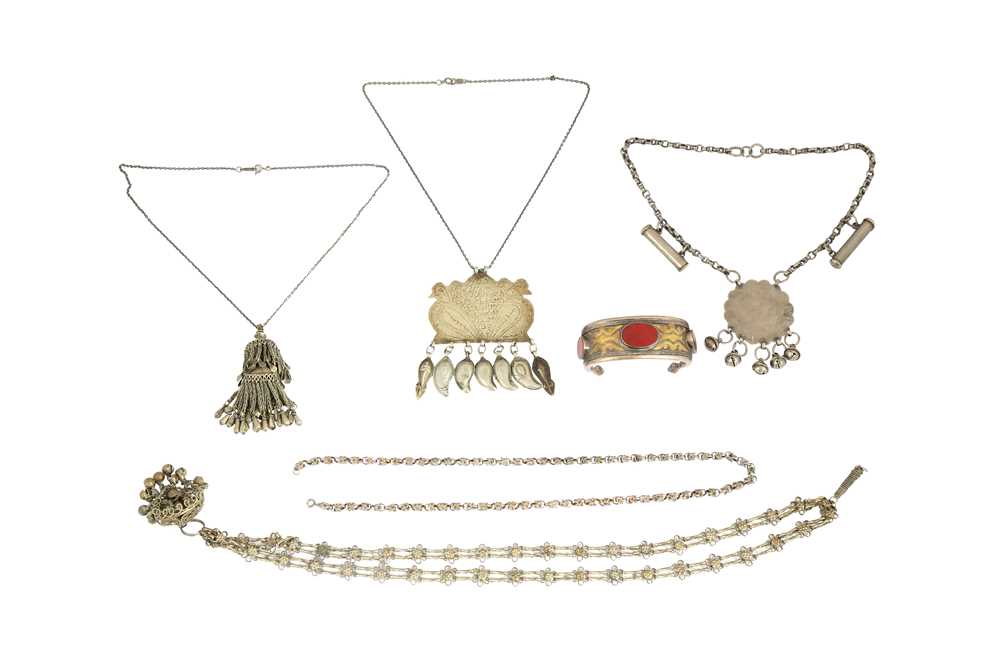 Lot 177 - A GROUP OF FIVE SILVER AND WHITE METAL NECKLACES AND A CARNELIAN-ENCRUSTED TURKMEN BANGLE