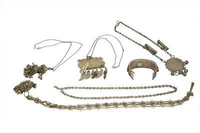 Lot 177 - A GROUP OF FIVE SILVER AND WHITE METAL NECKLACES AND A CARNELIAN-ENCRUSTED TURKMEN BANGLE
