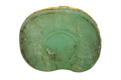 Lot 130 - A LARGE CARVED LOW-GRADE EMERALD FRAGMENT WITH GOLD-INLAID CALLIGRAPHIC BANDS