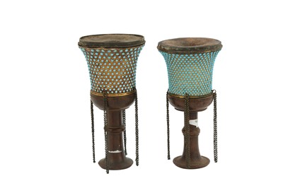 Lot 148 - TWO TURQUOISE-INSET GILT COPPER QALYAN CUPS WITH WOODEN STEMS