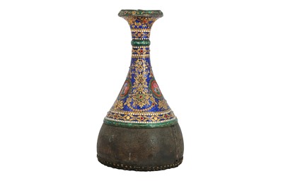 Lot 203 - A QAJAR GILT AND ENAMELLED SILVER AND LEATHER QALYAN BOTTLE