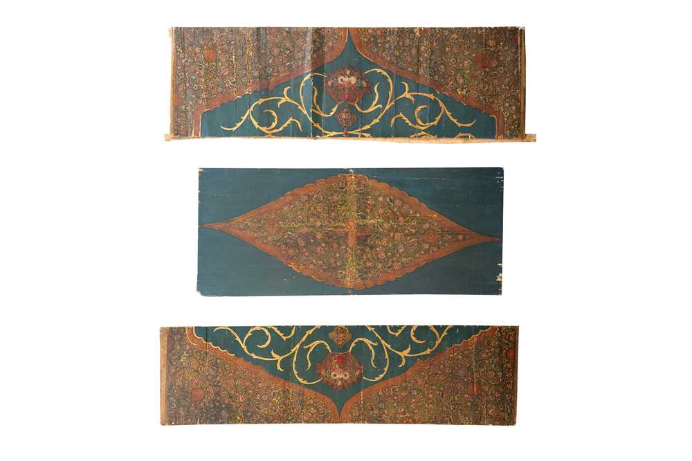 Lot 101 - THREE LARGE QAJAR LACQUERED AND POLYCHROME-PAINTED WOODEN ARCHITECTURAL PANELS