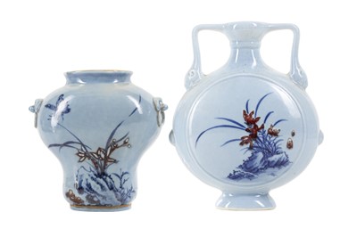 Lot 611 - A CHINESE BLUE AND COPPER-RED WALL VASE AND A MOON FLASK.