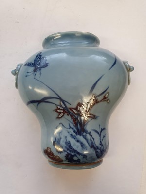 Lot 611 - A CHINESE BLUE AND COPPER-RED WALL VASE AND A MOON FLASK.