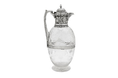 Lot 592 - A Victorian sterling silver mounted claret jug, London 1899 by John Grinsell and Sons