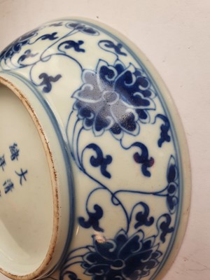 Lot 590 - A CHINESE BLUE AND WHITE 'LOTUS SCROLL' DISH.