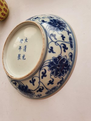 Lot 590 - A CHINESE BLUE AND WHITE 'LOTUS SCROLL' DISH.