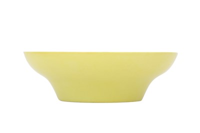 Lot 545 - A CHINESE YELLOW-GLAZED OGEE BOWL.