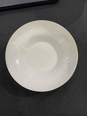 Lot 545 - A CHINESE YELLOW-GLAZED OGEE BOWL.