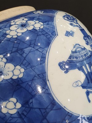 Lot 130 - A CHINESE BLUE AND WHITE 'HUNDRED ANTIQUES' JAR.