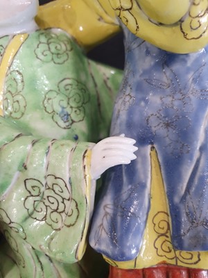 Lot 109 - A CHINESE ENAMELLED BISCUIT 'LOVERS' GROUP.