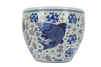 Lot 957 - A LARGE CHINESE BLUE AND WHITE AND RED FISHBOWL.