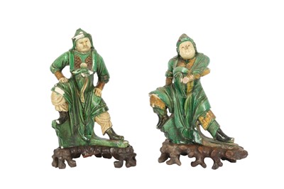 Lot 878 - TWO CHINESE SANCAI-GLAZED 'WARRIOR' ROOF TILES.