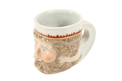 Lot 602 - A CHINESE FAMILLE ROSE 'NEPTUNE'S HEAD' MUG.