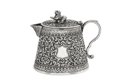Lot 168 - A late 19th century Anglo – Indian unmarked silver lidded milk or cream jug, Cutch circa 1880