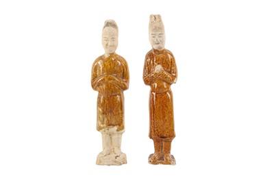 Lot 880 - TWO CHINESE GLAZED POTTERY FIGURES OF OFFICIALS.