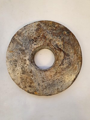 Lot 351 - A CHINESE JADE BI DISK.