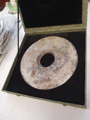 Lot 351 - A CHINESE JADE BI DISK.