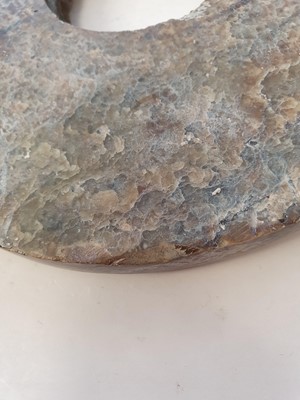 Lot 351 - A CHINESE JADE BI DISK.