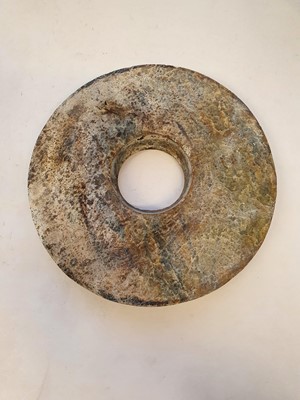 Lot 351 - A CHINESE JADE BI DISK.