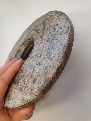 Lot 351 - A CHINESE JADE BI DISK.