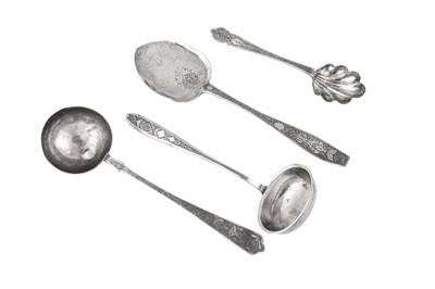 Lot 299 - Four mid-20th century Iranian (Persian) silver serving implements, Isfahan circa 1940