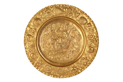 Lot 246 - A MID 19TH CENTURY GILT METAL REPOUSSE DISH DEPICTING A BEAR HUNT, PROBABLY RUSSIAN