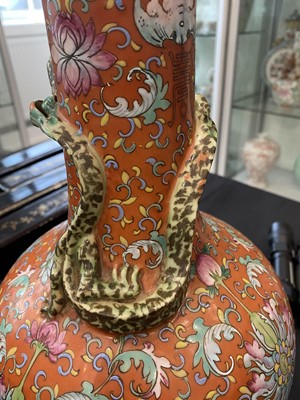 Lot 276 - A CHINESE FAMILLE ROSE CORAL-GROUND VASE.