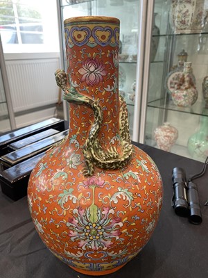 Lot 276 - A CHINESE FAMILLE ROSE CORAL-GROUND VASE.