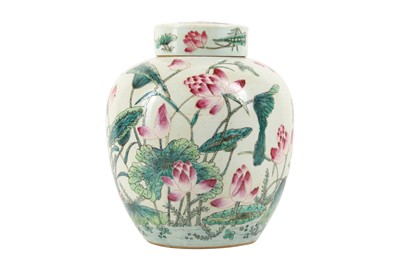 Lot 685 - A CHINESE FAMILLE ROSE 'LOTUS POND' JAR AND COVER.